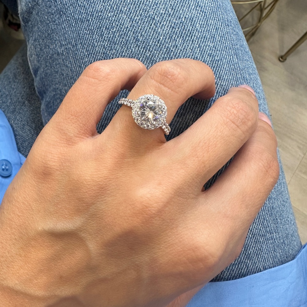 Gorgeous solitaire with halo.